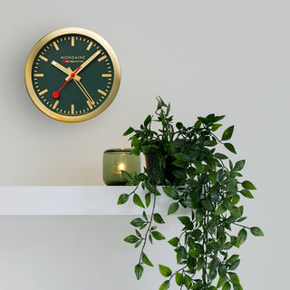 Table clock, 125mm, Forest Green Table and Alarm Clock, A997.MCAL.66SBG, mood image of the clock on the wall